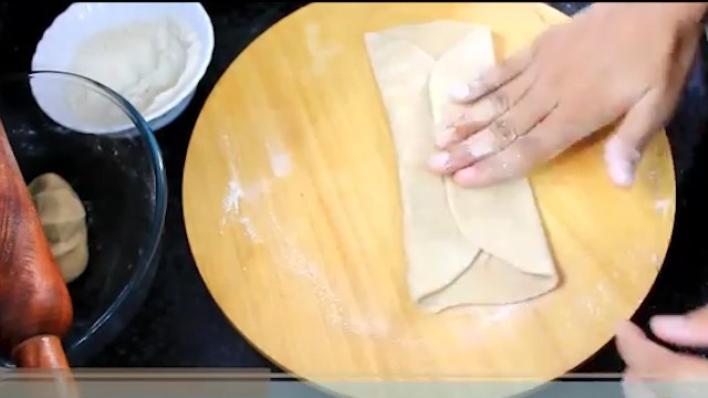 fold the chapati to a square