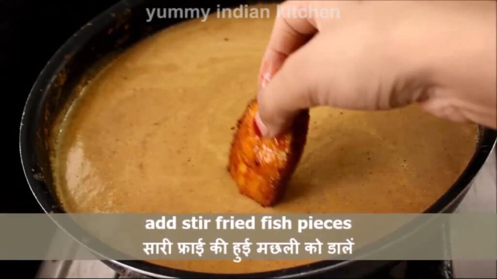 adding the stir-fried fish pieces 