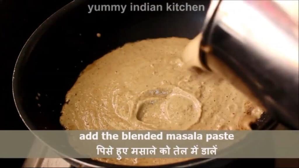 Adding the blended masala paste