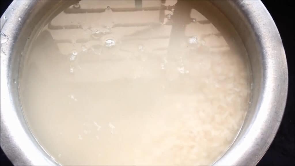 soaking the rice to make hyderabadi mutton biryani