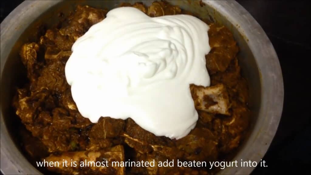 adding beaten yogurt