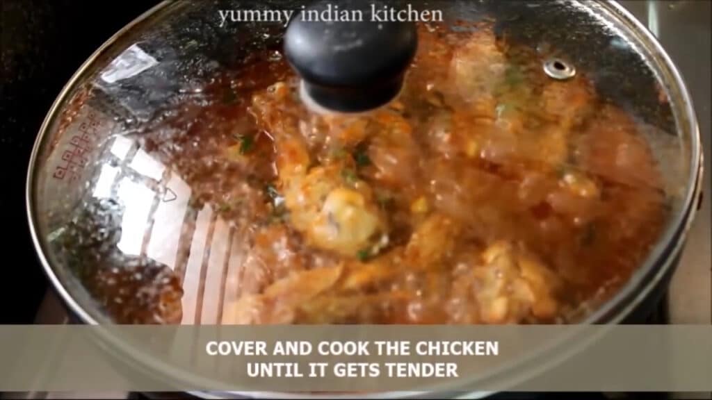 cooking the indian chicken curry until done