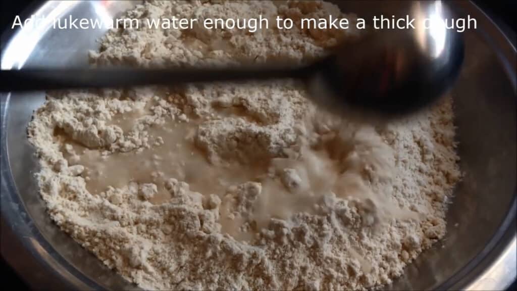add some warm water into the flour