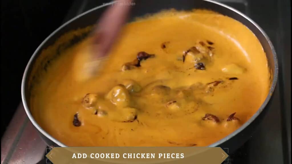Adding boneless chicken pieces to the murgh makhani gravy