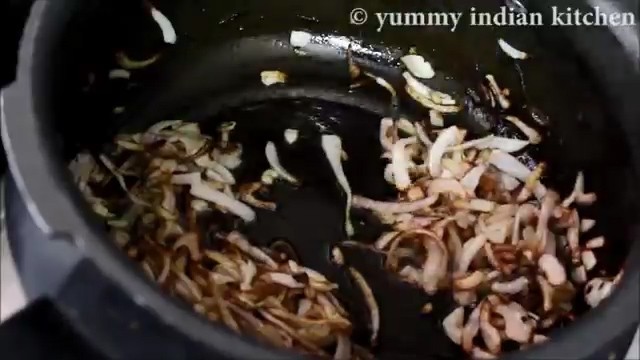 cooking the onions until they turn slight brown in colour
