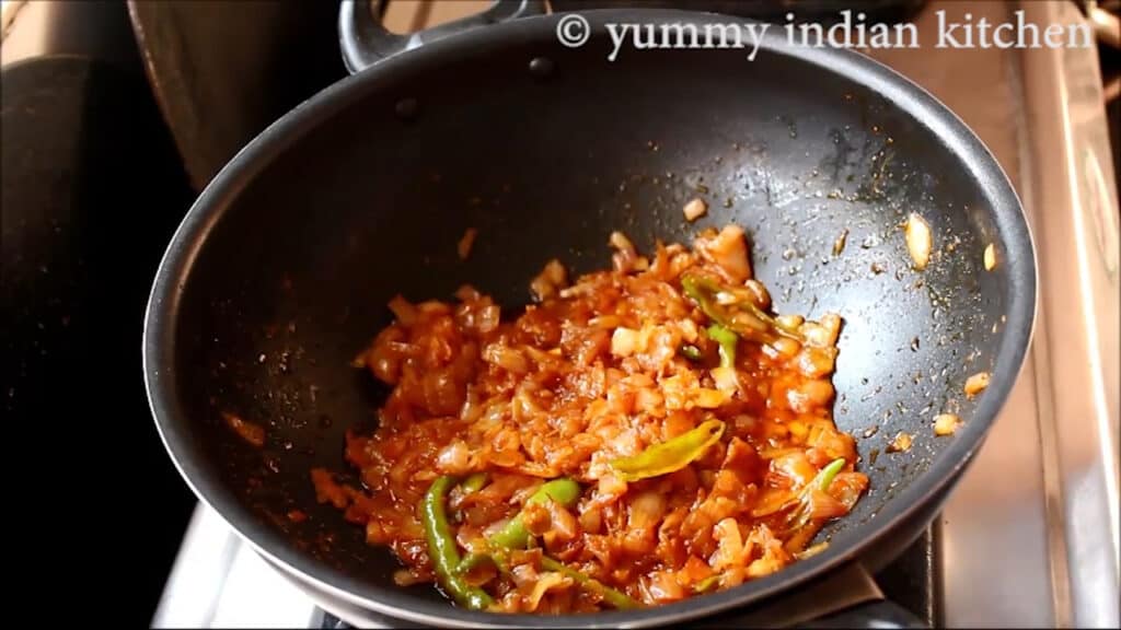 cook until the masala leaves oil at the sides
