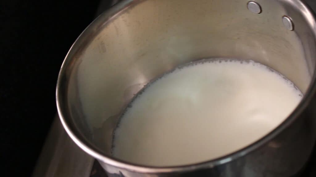 Bringing the milk to one boil