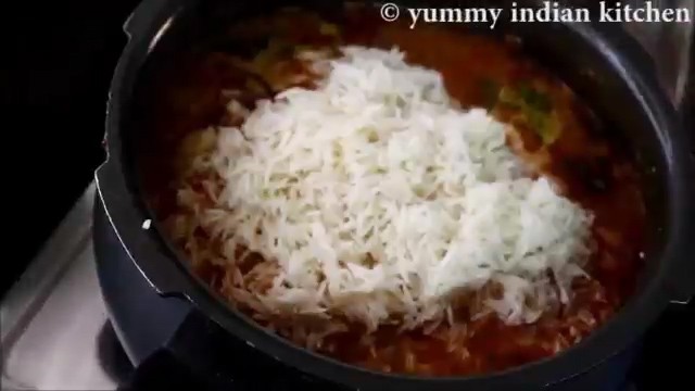 Adding the soaked basmati rice