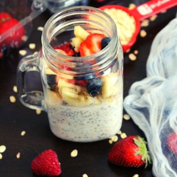 overnight oats recipe to lose weight in a jar with fruits and nuts as garnishing