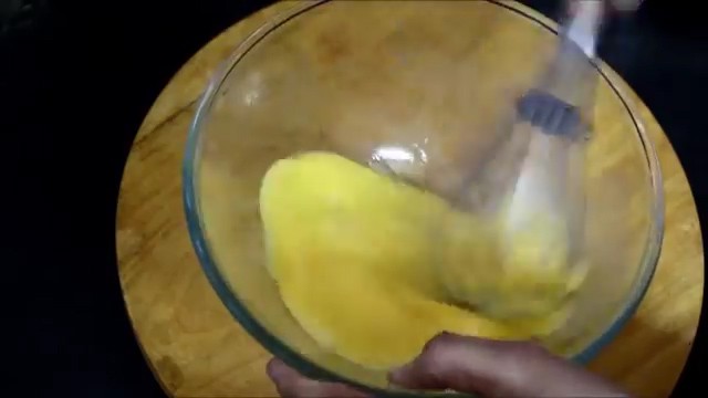 adding 2 eggs and beating them