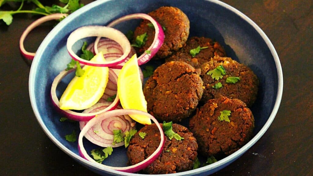 shami kabab served in a plate