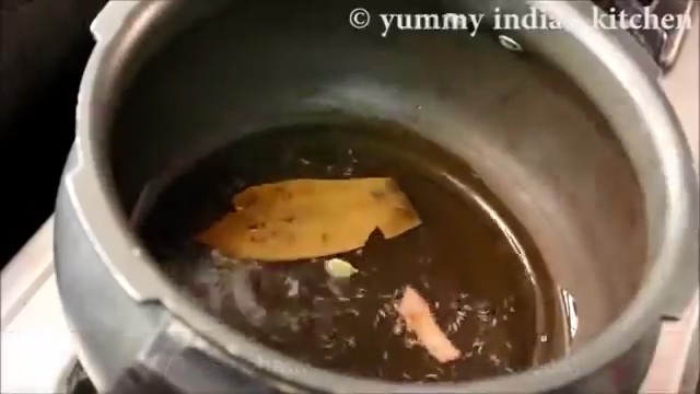adding whole spices to oil