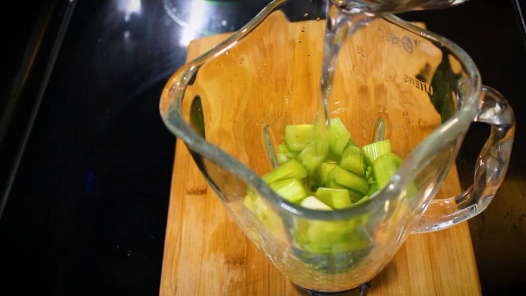 adding little water to make the celery juice