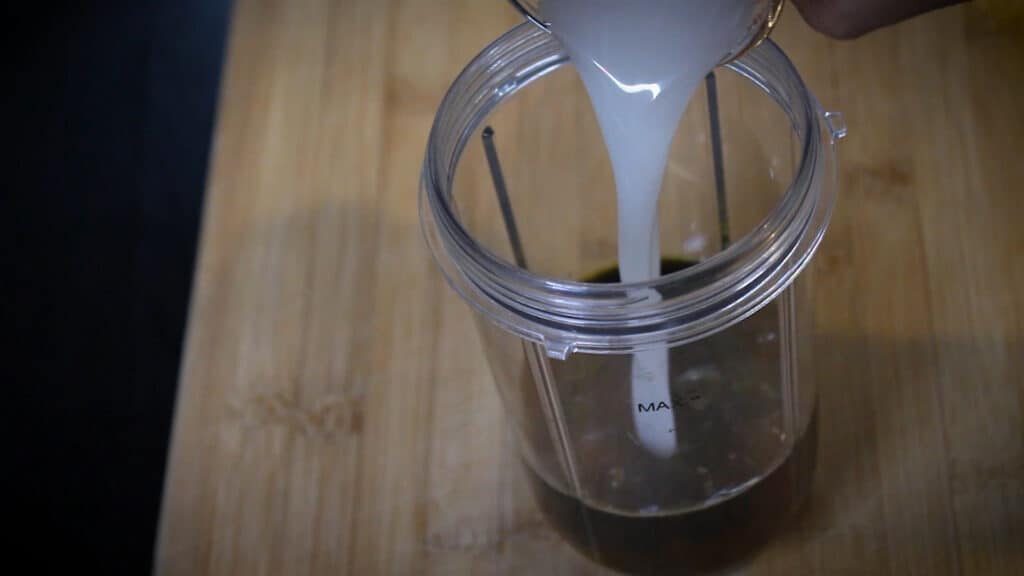 adding coconut milk