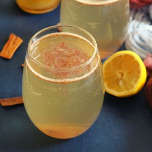 apple cider vinegar and honey drink served in a glass