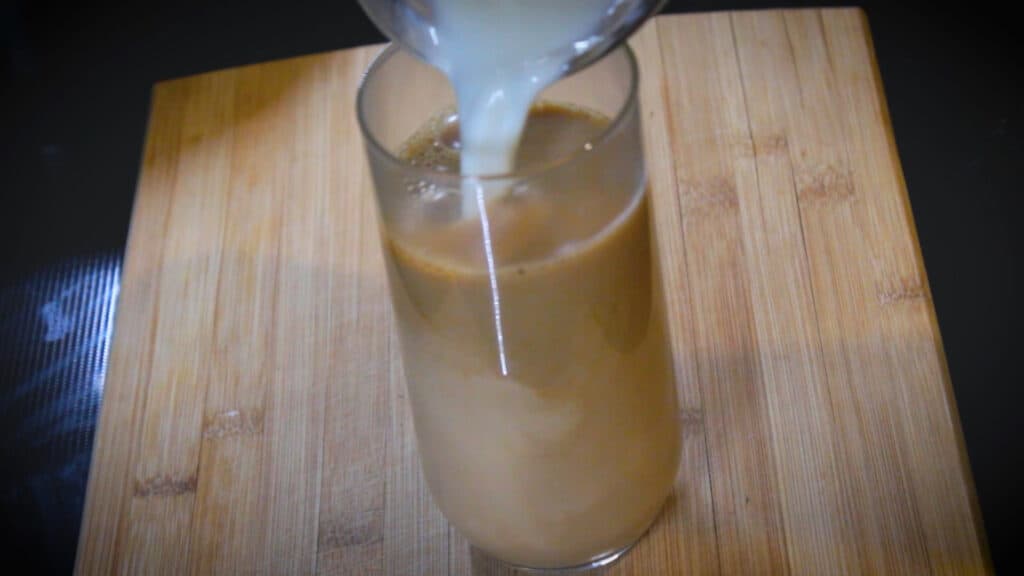 pouring boiled milk