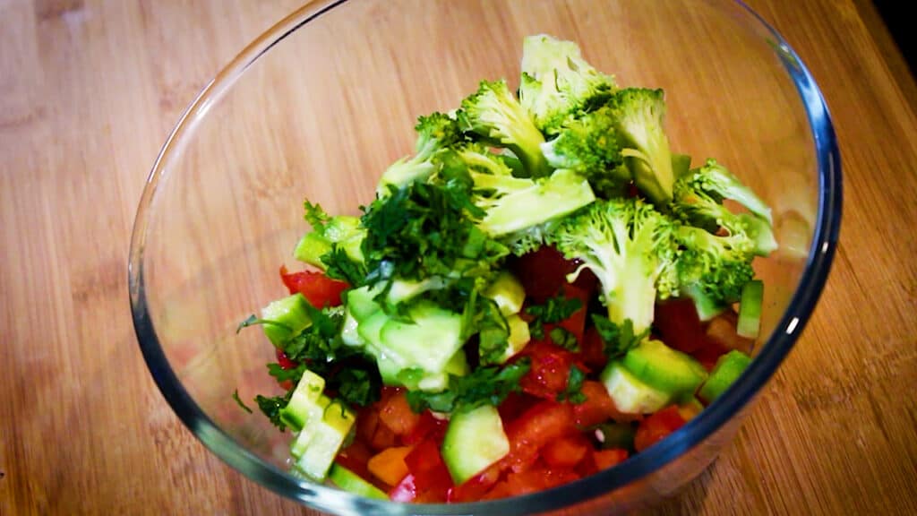veggies into a bowl to make weight loss salad