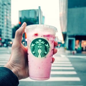 fruity starbucks drinks with pink drink flavor drink cup holding in hand
