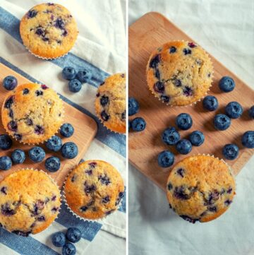 blueberry muffins made on a board with bluerries beside