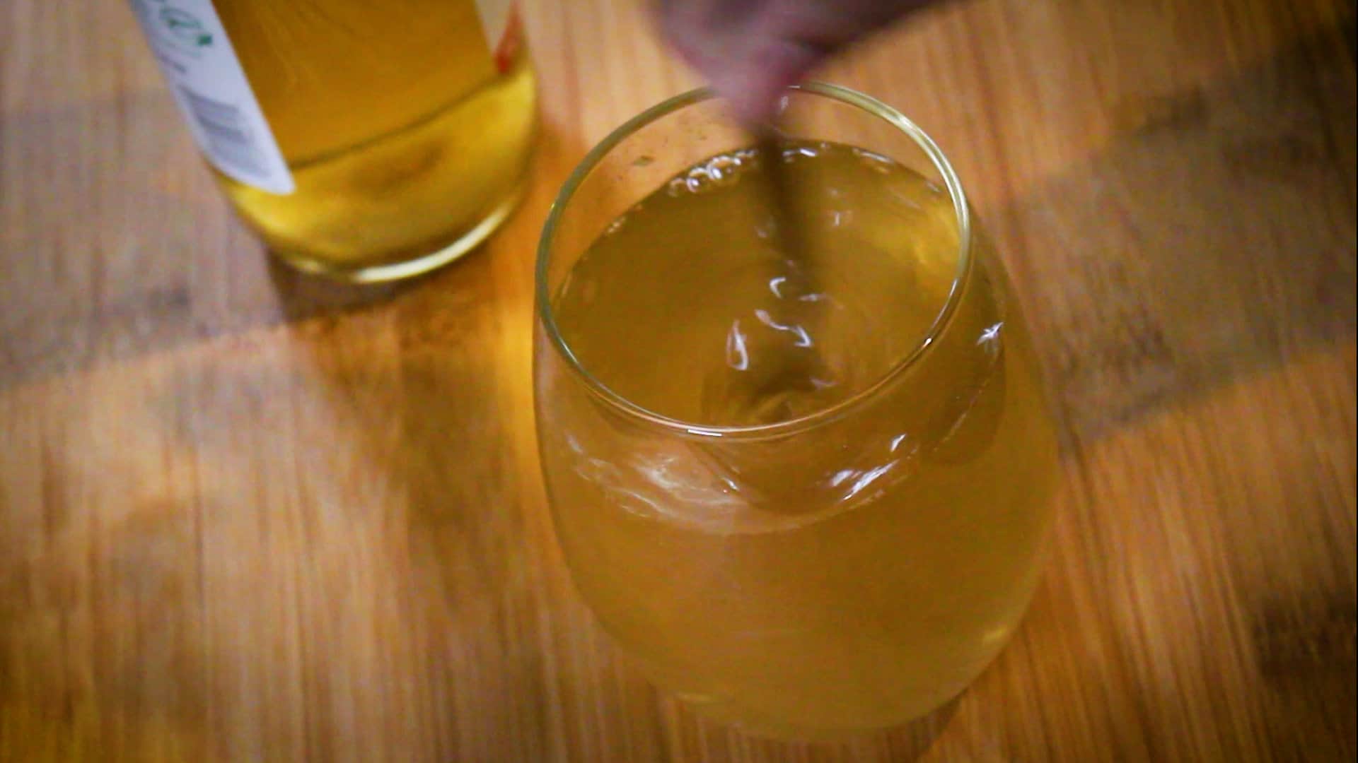 stirring the ingredients to finish apple cider vinegar and honey.