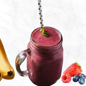 fruit smoothie recipe with yogurt in a mason jar with banana and berries shown beside the jar