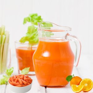 showing anti inflammatory juice in a jar with fruits around